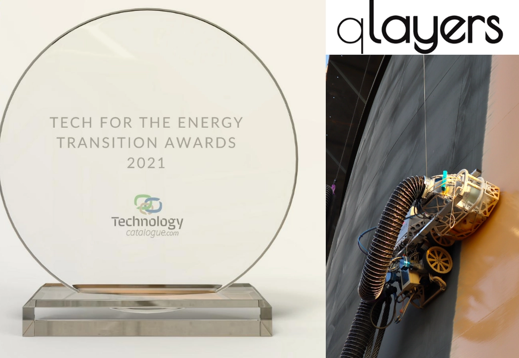 Qlayers' robotic coating system, a finalist for the Tech for the Energy Transition Awards 2021, shown alongside the award trophy